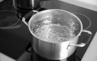 At what temperature does water boil?